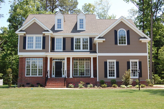 Large Tan Home with Lots of Windows and Property Insurance in Charlotte, NC 