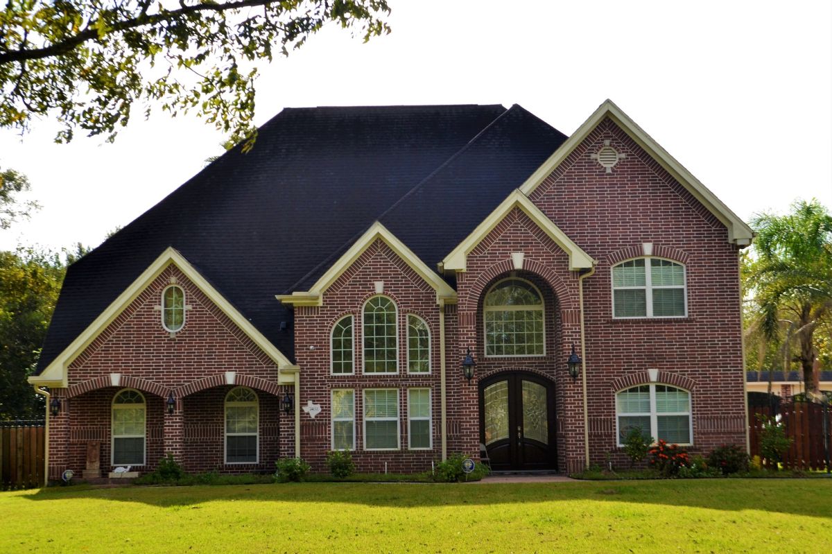 Two Story Red Brick House with Property Insurance in Charlotte, NC 